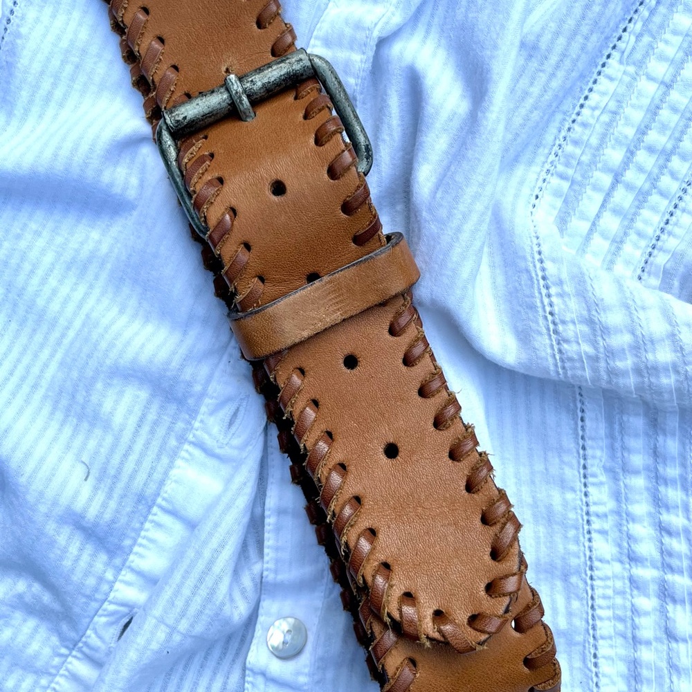 Leather belt with cord wrap detail on edge